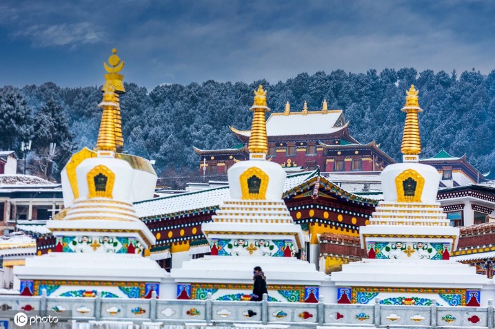 Snow-covered Tibetan Buddhist temple in Gansu