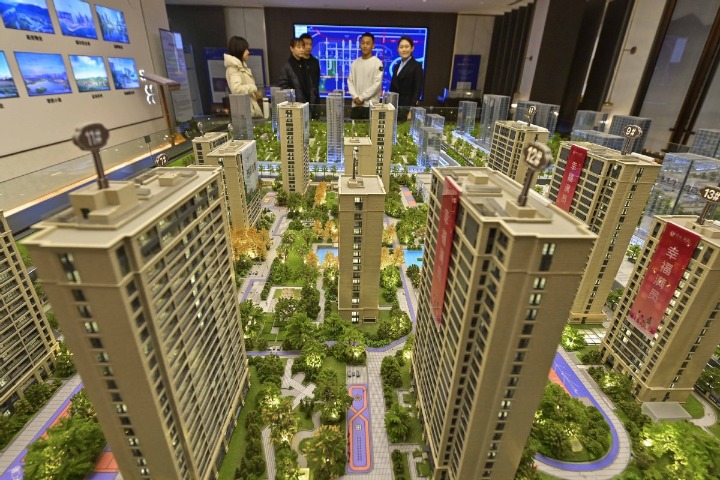 China to cut lower limit for interest rates on first-home loans