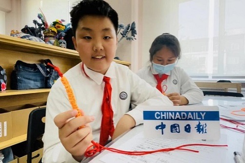 Pupils try knitting, knotting, planting, cooking