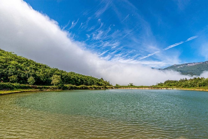 Waterfall of clouds over Chongqing mountain a tourist attraction