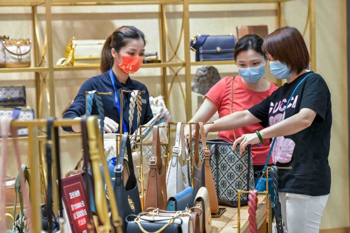 Chinese luxury brands can help boost domestic consumption