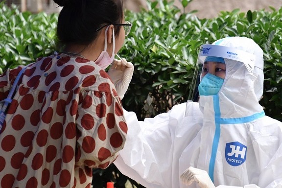 Beijing finds infections, looks to prevent more