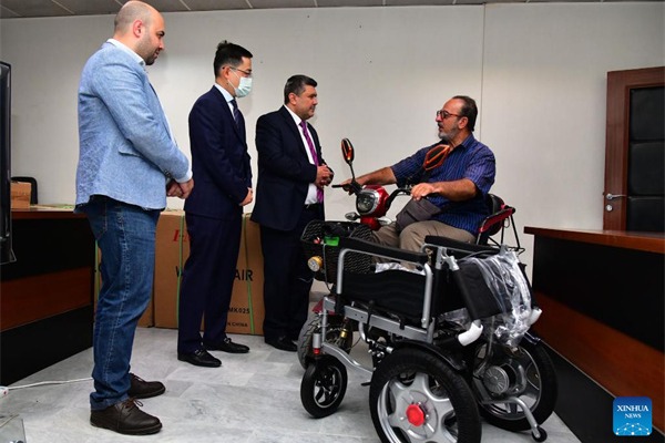 Chinese embassy donates electric wheelchairs to disabled Syrians