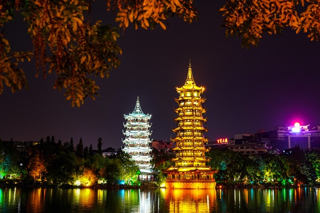 Twin pagodas in Guilin reflected in lake