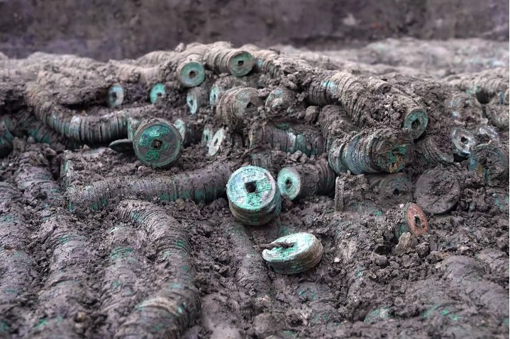 Tonnes of millennia-old coins found in East China