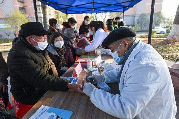 China reiterates commitment to share COVID data with WHO, world