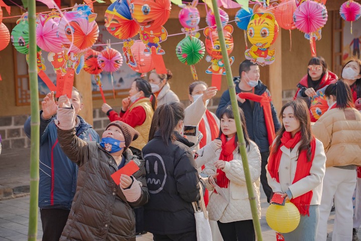 People celebrate the upcoming Lantern Festival in Wuhan