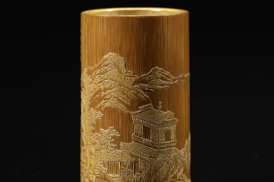 Qing Dynasty bamboo brush pot with landscape patterns