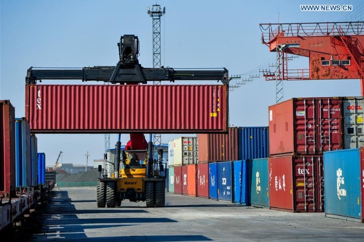 Empty shipping containers sign of China's economic prowess