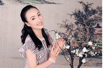 Artist inherits, promotes Sichuan Opera