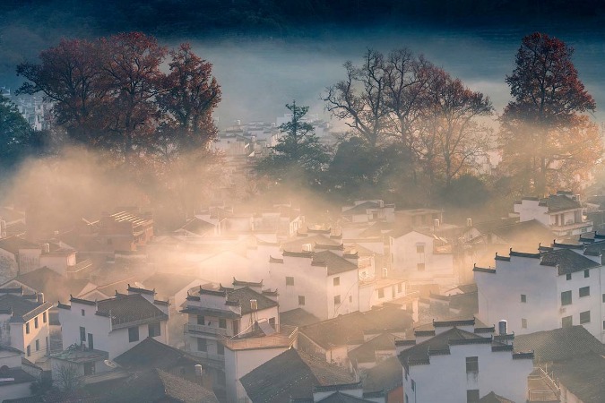 Huangling village shrouded by mist