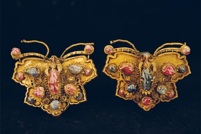 Gold butterflies embedded with gemstones
