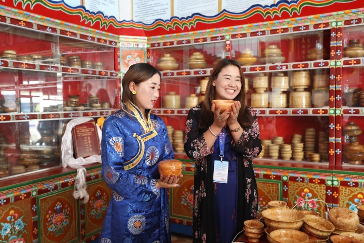Traditional wooden bowls help lift Tibetan village out of poverty