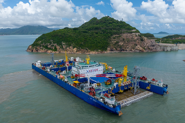 China links up final tube in mega cross-sea tunnel