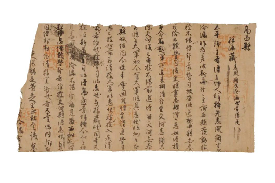 Documents unearthed in Xinjiang show records of local history and culture