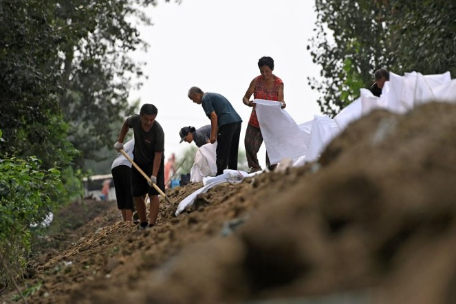 China beefs up efforts in flood relief, reconstruction