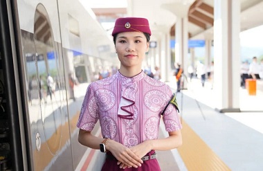 Maonan ethnic train conductor proud of new high-speed rail