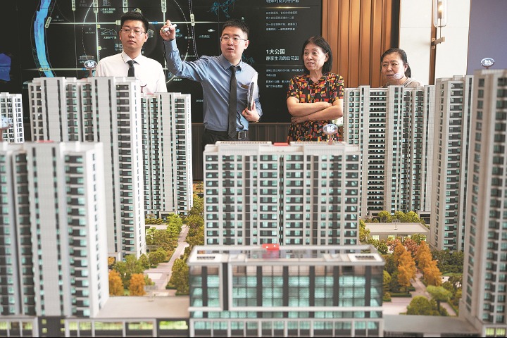 China adjusts housing credit policies
