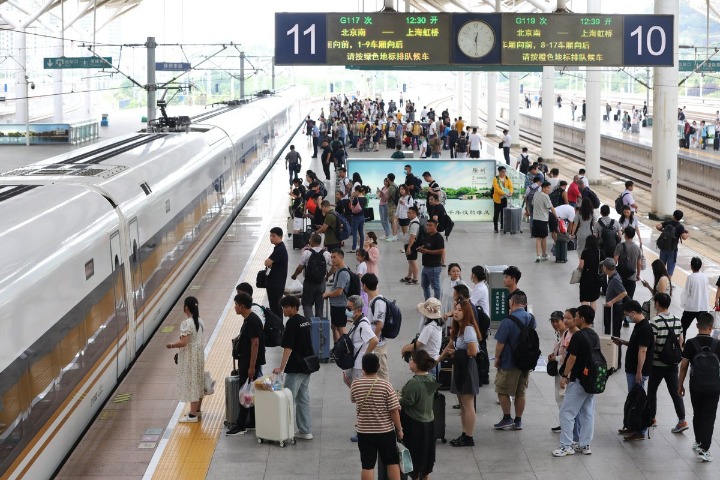 China sees record train-ticket sales as holidays approach
