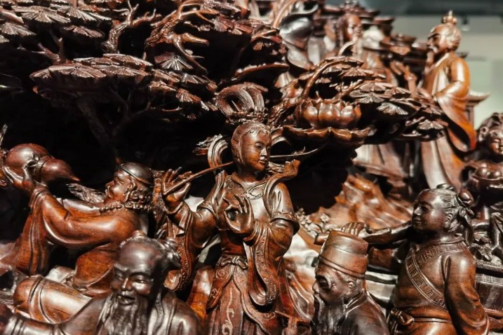 Suzhou exhibition highlights local artist’s woodcarving art