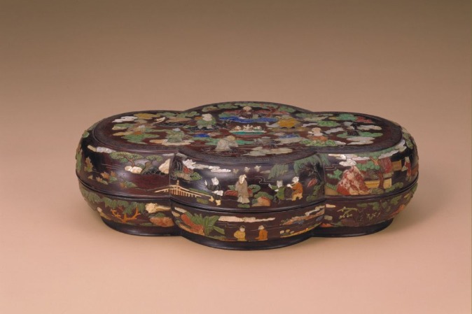 Intricately crafted red sandalwood box from the Qing Dynasty imperial court