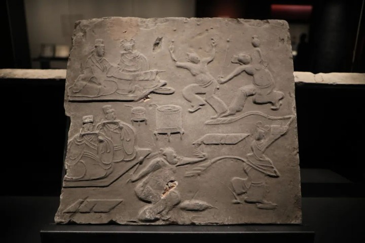 Brick relief depicts leisure pursuits of an aristocratic household nearly 2,000 years ago