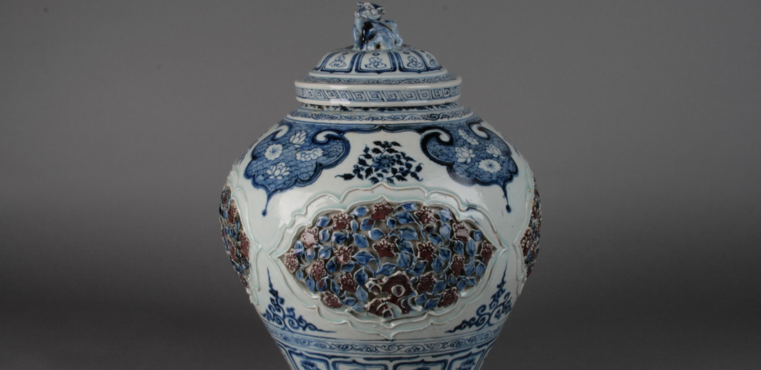 Yuan Dynasty lidded jar with blue-and-white and under-glazed red decorations