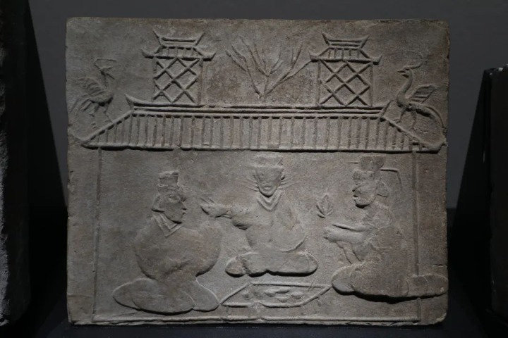 Brick relief captures joy of banquet 2,000 years ago