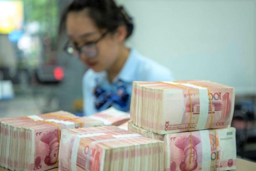China's central bank adds liquidity via reverse repos, RRR cut