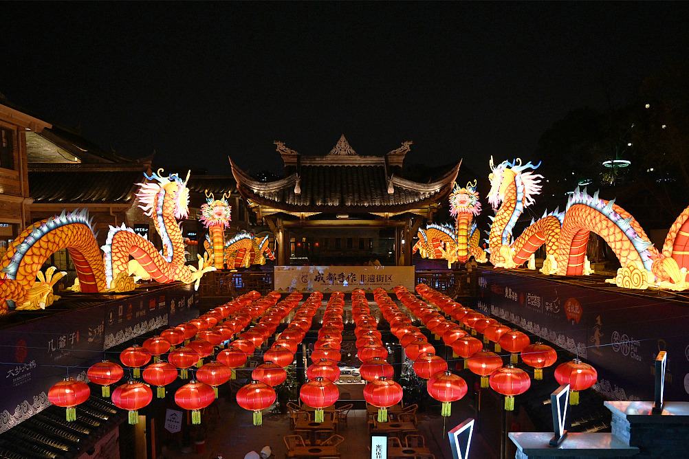 Dragon lanterns illuminate the night sky in Chengdu