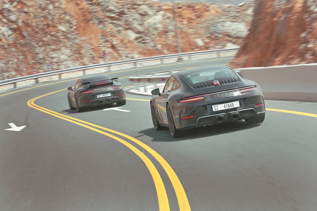 Iconic Porsche sports car 911 boasts hybrid power sources