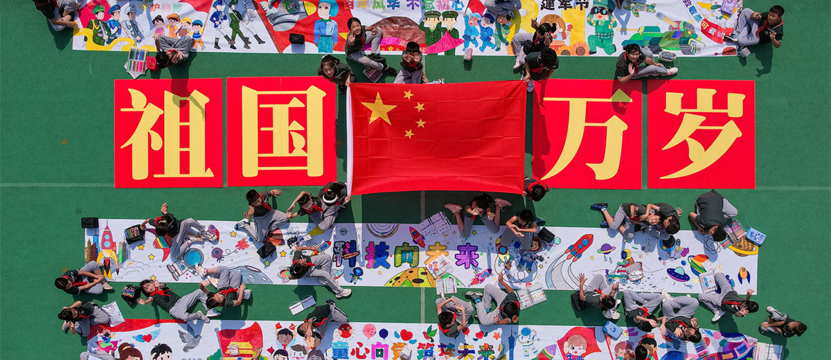 Qingdao kids paint their excitement for National Day