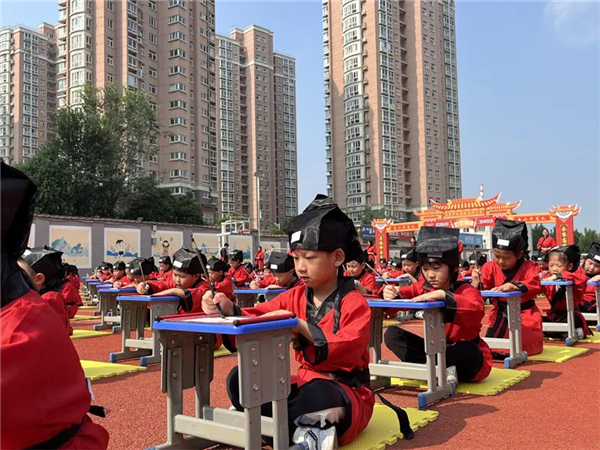 Kids excited for first writing ceremony in Tai'an