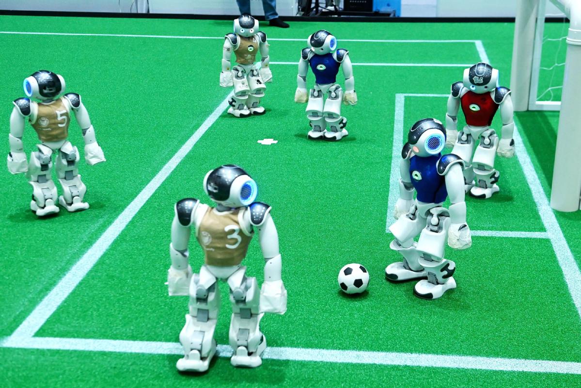 Humanoid robots play football in Qingdao