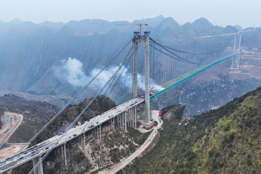 China completes main structure of world's tallest bridge