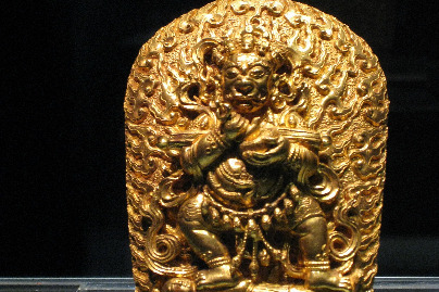 Golden accessory of a Buddhist deity with snakes