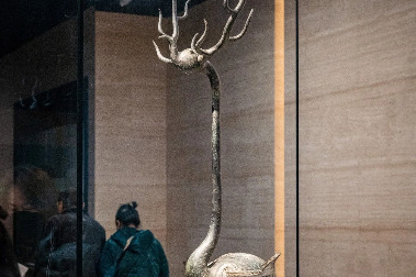 Bronze creature combines deer and crane