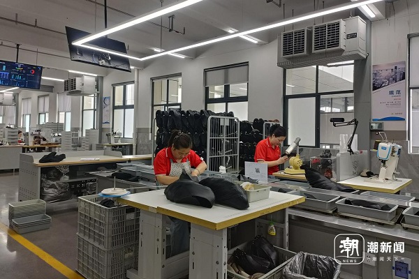 Wenzhou shoe maker stands firm against US price cut demand