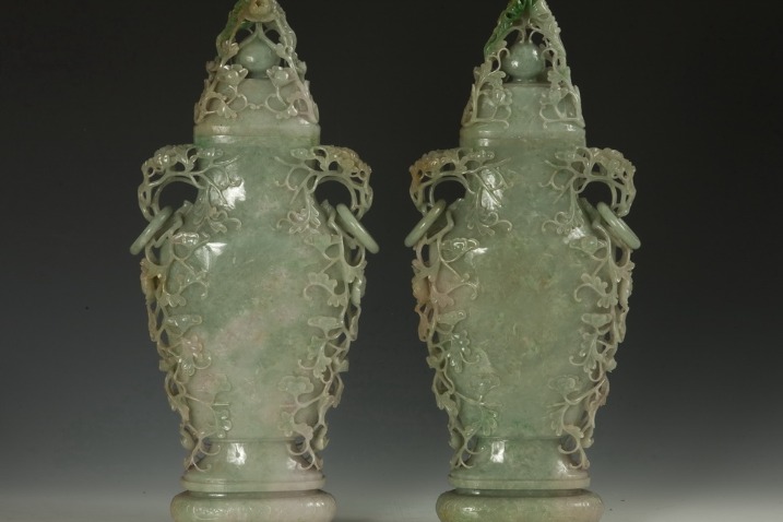 Paired jadeite vases with openwork decorative motifs