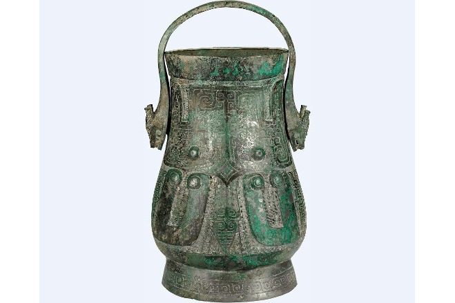 Shang Dynasty bronze wine container with beast mask motifs