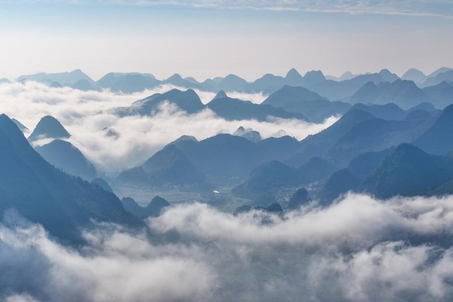 Wanfenglin's karst peaks wear ethereal winter veil in Guizhou