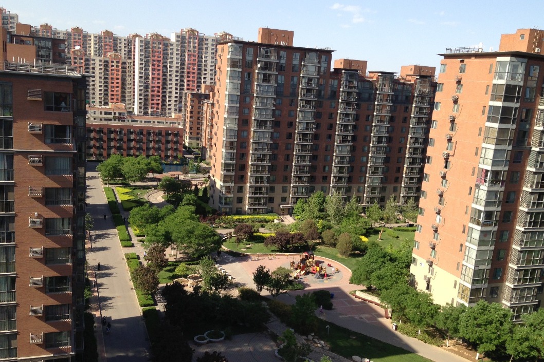 Beijing makes it easier for families to buy property