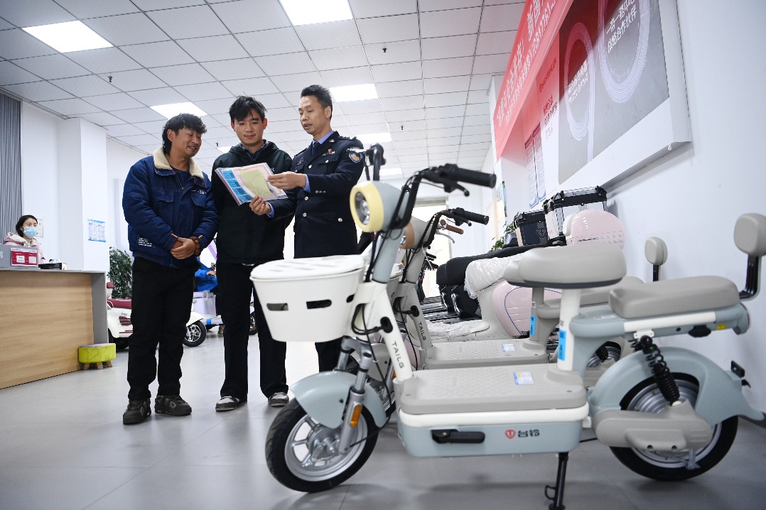 Beijing mandates helmets for e-bike users, bans scooters