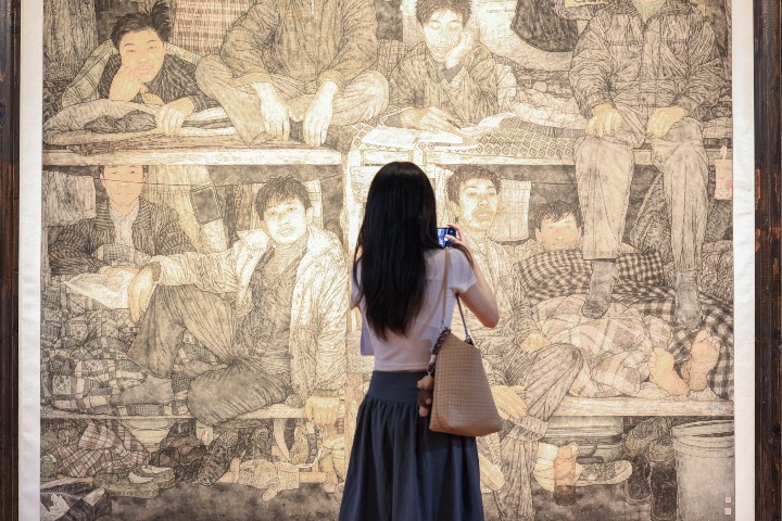 Li Chuanzhen's worker-themed paintings on view in Wuhan