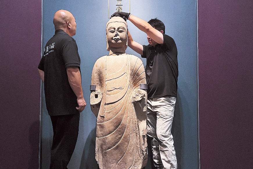 Newly found head tops off Buddha statue